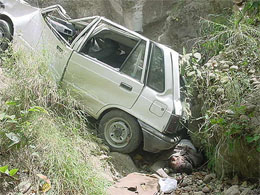 The body of Mr Karam Veer Verma lying under the car