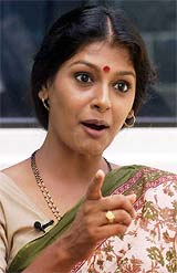 Bollywood star Nandita Das gestures as she speaks to journalists