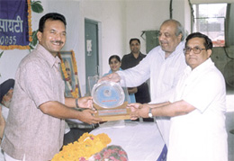 Former Test cricketer Madan Lal being welcomed by K C Vij and Virender Katyal