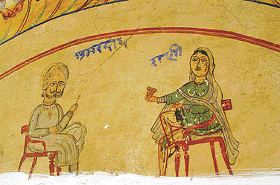 A Rani pointing a weapon at the Raja