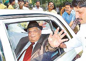 Goodbye, says Punjab Governor and UT Administrator J.F.R. Jacob as he leaves the Punjab Raj Bhavan in a white Mercedes pushed by employees in a symbolic way in Chandigarh on Thursday. 