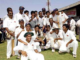 The jubilant Mumbai team members with the Ranji Trophy 