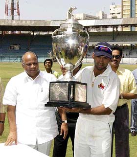 Mumbai skipper Paras Mahambarey with the Ranji trophy