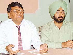 Vaid Khaliq Ahmed Shibli (left) addresses a press conference in Chandigarh on Friday.