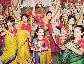 Girls pay tributes to Rabindra Nath Tagore on his 142nd birth anniversary at Banga Bhavan in Sector 35, Chandigarh, on Friday. 