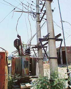 An electricity transformer has been lying on the ground in Badhawa Nagar Colony in Bartana village, near Zirakpur, for the past couple of years.