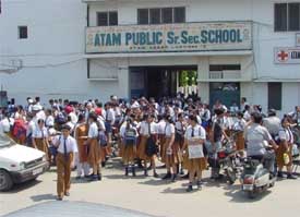Students of Atam Public Senior Secondary School, Atam Nagar, coming out of the school