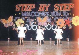 A song and dance routine at Step By Step
