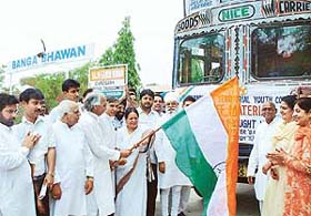 All-India Congress Committee general secretary Mohsina Kidwai flags off a truckload of drought relief