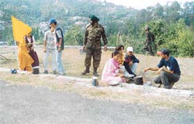 Schoolchildren participate in a jungle survival camp