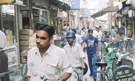 The narrow Pindi Street which remains �choked� with bicycles, cycle-rickshaws and scooters parked there