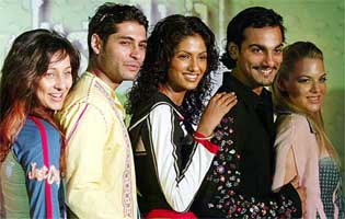 Models display western clothes from a ready-to-wear summer collection by designer Manish Malhotra 