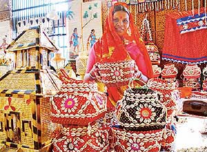 A woman from Chhattisgarh shows her creations at an exhibition of handicrafts and handloom, �Shabari�, being held at Lajpat Rai Bhavan in Chandigarh on Wednesday.