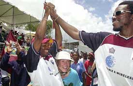 West Indies captain Brian Lara celebrates with Chris Gyle 