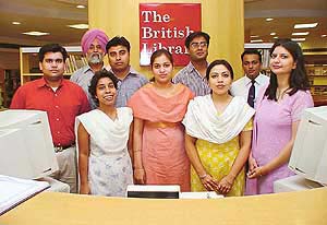A team of The British Library, along with Manager Sushant Banerjee, prepares to celebrate the third anniversary of the library.