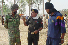 �Well done boys�, says Brig Sunil Dhawan to Hav Bhagwan Singh (left) and Hav J. D. Singh.