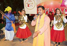 Folk artistes perform at Plaza carnival in Sector 17, Chandigarh