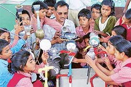 Vijay Pal Goel teaching the art of making figurines out of waste material to students of Asha School, Sector 25, and Colony No. 5 at Kala Sagar in Sector 36, Chandigarh