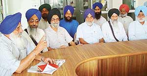 Mr Gurpratap Singh Riar (left), chairman of the central coordination committee of all-gurdwaras and Sikh institutions of Chandigarh, addresses mediapersons in Chandigarh 