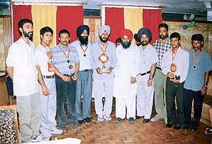 Participants of the first South Asian Draughts Championship for Men that concluded in Patiala on Sunday. 