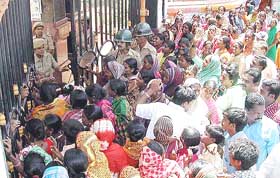 The casual workers of the Hubli Dharawad Municipal Corporation demonstrate in front of corporation premises