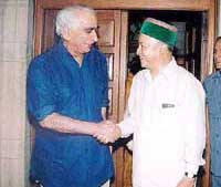 Union Finance Minister Jaswant Singh with Himachal Pradesh Chief Minister Virbhadra Singh in New Delhi on Tuesday.