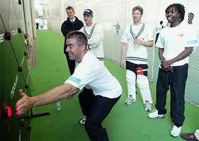 Zimbabwe captain Heath Streak plays a reaction game at Lords cricket ground 