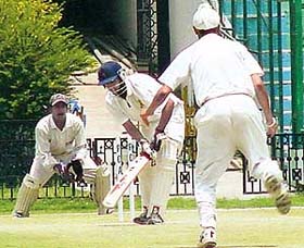 Gagandeep of Mohali-XI traps Harpreet of Chandigarh-XI in front of the wicket in the Punjab Inter-district Under-19 Cricket Tournament