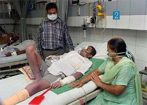 A semi-conscious Sangeeta waits for a miracle