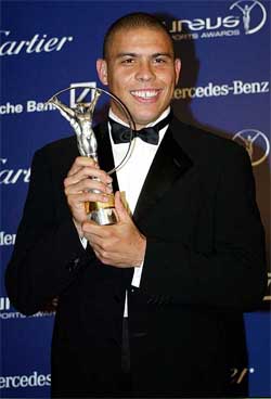 Ronaldo of Brazil holds his Laureus World Comeback of the Year Award in Monte Carlo
