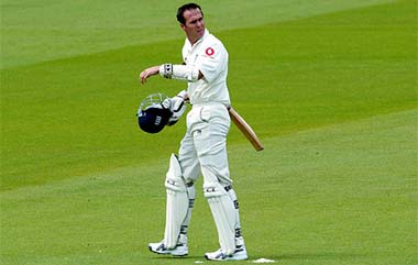 England batsman Michael Vaughan returns to the pavilion after being bowled by Zimbabwe captain Heath Streak