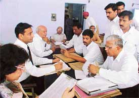 Mr S. K. Aggarwal, Additional Sessions Judge, hearing cases during a labour lok adalat