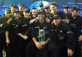 The New Zealand team poses after beating Pakistan