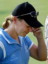 Sweden's Annika Sorenstam cries as she walks off the 18th green at the Colonial Golf Tournament in Fort Worth, Texas, on Friday. 