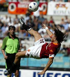 AS Roma captain Francesco Totti attempts a scissor kick during Roma's Serie A match against Atalanta