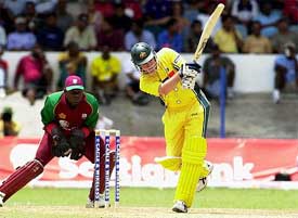 Michael Clarke of Australia bats as West Indies wicketkeeper Ridley Jacobs looks