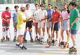 National roller hockey probables take tips from their coach at KB DAV Centenary School, Sector 7, Chandigarh