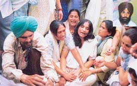 Relatives of Havildar Kuldip Singh mourn his death in Ludhiana
