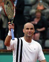 Andre Agassi of the US celebrates his victory over Karol Beck of Slovakia 