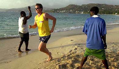 Australian fast bowler Brett Lee runs at the Grand Anse Beach on the Caribbean island of Grenada