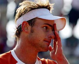 Andy Roddick of the US reacts during his match against Sargis Sargsian of Armenia