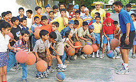 Basketball trainees of Tender Heart School, Sector 33, at a summer camp on the school campus.