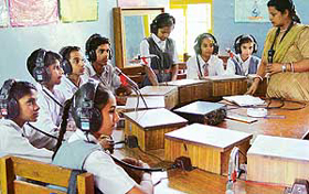 Children use a group hearing aid during classes at �Vatika�, a school for deaf and dumb children, in Sector 19, Chandigarh, on Thursday.