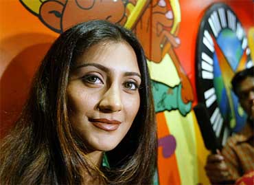 Bollywood star Rimi Sen smiles during the music launch