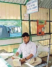 Physically challenged Rajinder Kumar at a pre-paid booth