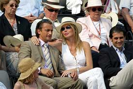 French former tennis champion Henri Leconte is seen in the VIP stands