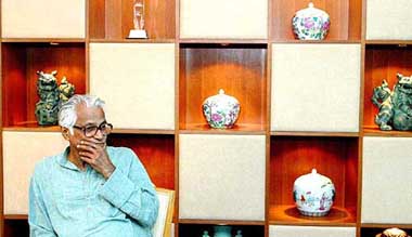 Defence Minister George Fernandes listens to a question during a press conference in Singapore on Sunday.