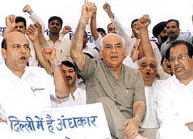 THE FIRST CITY�S DARK PERIOD: Delhi BJP president Madan Lal Khurana with other activists sitting on dharna in protest against water, electricity problems and corruption in the MCD at Town Hall in the Capital on Monday