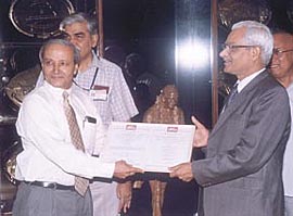 Mr C.P. Jain, CMD, NTPC, receiving the prestigious ISO 9001-2000 certificate from Mr M.S. Gaur, Regional Manager (North) BVQI, in the Capital for its corporate engineering division