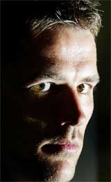 England striker Michael Owen speaks during a news conference 